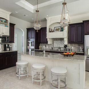 Traditional open concept kitchen designs - Open concept kitchen - traditional l-shaped beige floor open concept kitchen idea in Other with a drop-in sink, raised-panel cabinets, purple cabinets, multicolored backsplash, stainless steel appliances and an island