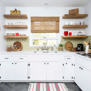 Inspiration for a small country l-shaped kitchen in Raleigh with a double-bowl sink, green splashback, no island and white cabinets.