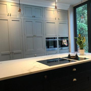 Stunning handmade kitchen with full height beaded cabinets including larder and