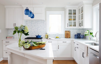 White Cabinets and Blue Accents Brighten a Kitchen