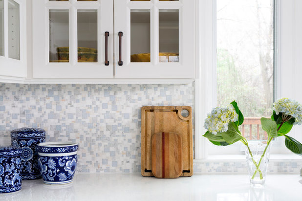 White Cabinets and Blue Accents Brighten a Kitchen