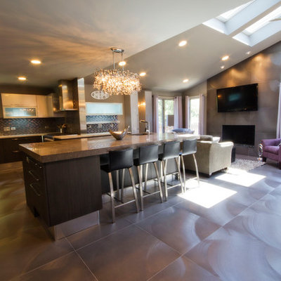 Example of a trendy eat-in kitchen design in Chicago with flat-panel cabinets, dark wood cabinets and multicolored backsplash