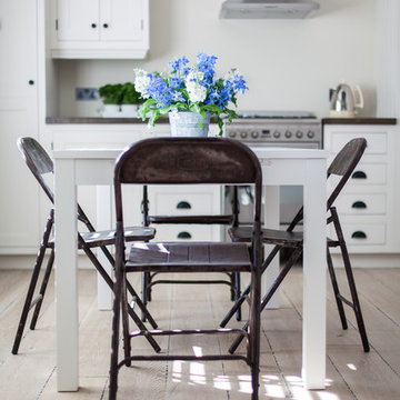 Stunning, white rustic handmade kitchen with large island