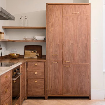 Stylish Freestanding Walnut Kitchen with Concrete worktops