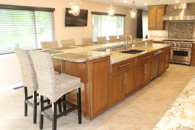 Large transitional l-shaped porcelain tile and beige floor eat-in kitchen photo in St Louis with an undermount sink, flat-panel cabinets, medium tone wood cabinets, quartz countertops, multicolored backsplash, subway tile backsplash, stainless steel appliances and an island