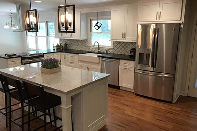 Example of a cottage kitchen design in Charlotte