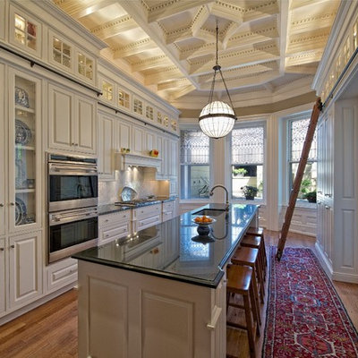 Inspiration for a timeless enclosed kitchen remodel in Philadelphia with beaded inset cabinets, stainless steel appliances and beige cabinets