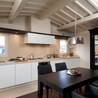 Esempio di una grande cucina contemporanea con lavello sottopiano, ante lisce, ante bianche e elettrodomestici in acciaio inossidabile