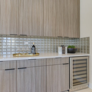 Open concept kitchen photos - Inspiration for a l-shaped open concept kitchen remodel in San Francisco with an undermount sink, flat-panel cabinets, light wood cabinets, stainless steel appliances and an island