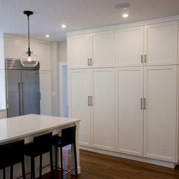 Sunny kitchen expansion with mudroom, pantry and half bath