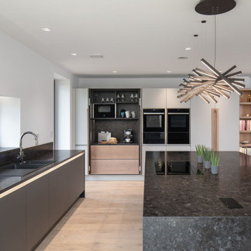 Supermatte graphite and light oak with bespoke oak handle detail