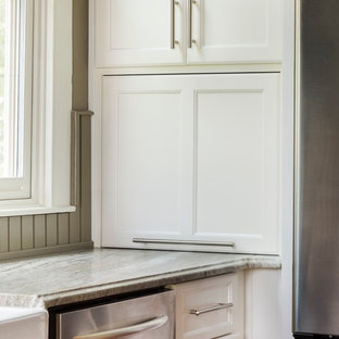 Design ideas for a large country separate kitchen in Atlanta with a farmhouse sink, shaker cabinets, white cabinets, limestone benchtops, green splashback, stainless steel appliances, medium hardwood floors and with island.