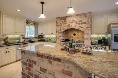 Example of a mid-sized classic l-shaped eat-in kitchen design in Houston with an undermount sink, raised-panel cabinets, granite countertops, beige backsplash, stainless steel appliances, an island and beige cabinets