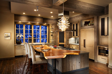 Photo of a rustic kitchen in San Francisco with wood worktops, recessed-panel cabinets, integrated appliances and light wood cabinets.