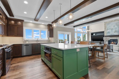Example of a mid-sized transitional l-shaped medium tone wood floor, brown floor and tray ceiling eat-in kitchen design in Other with an undermount sink, shaker cabinets, medium tone wood cabinets, quartz countertops, gray backsplash, glass tile backsplash, black appliances, an island and white countertops