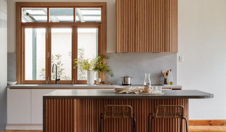 Curvaceous Midcentury Kitchen in Slatted Oak