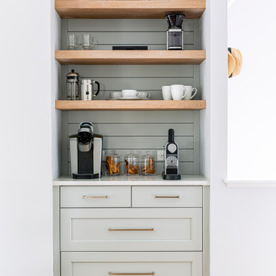 Beach style light wood floor kitchen pantry photo in New York with shaker cabinets, quartz countertops, blue backsplash, wood backsplash, white countertops and gray cabinets