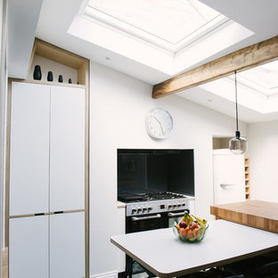 The Andertons: Monochrome Plywood Kitchen with Geometric Tiled Floor