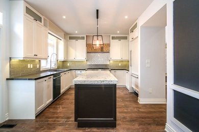 Example of a farmhouse kitchen design in Toronto