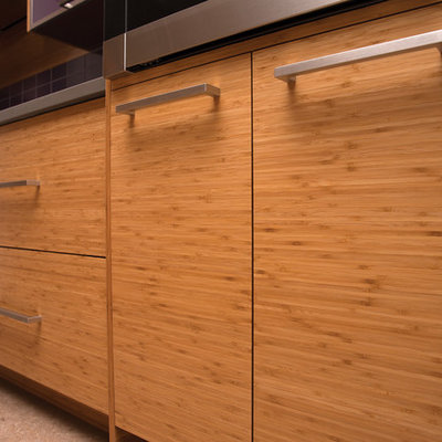 Example of a mid-sized trendy l-shaped cork floor and brown floor open concept kitchen design in Las Vegas with an undermount sink, open cabinets, light wood cabinets, solid surface countertops, subway tile backsplash, stainless steel appliances, an island and gray countertops