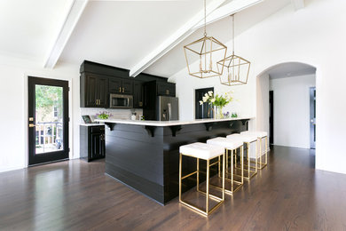 Eat-in kitchen - mid-sized modern eat-in kitchen idea in Charleston with recessed-panel cabinets, black cabinets, quartzite countertops, no island and white countertops