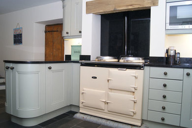 This is an example of a farmhouse kitchen in Devon.