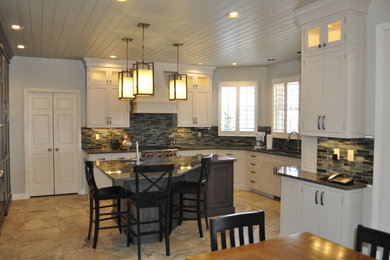 Example of a tuscan kitchen design in Huntington