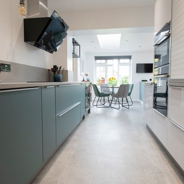 The main hub of the kitchen opens into a light bright dining area and cosy snug.