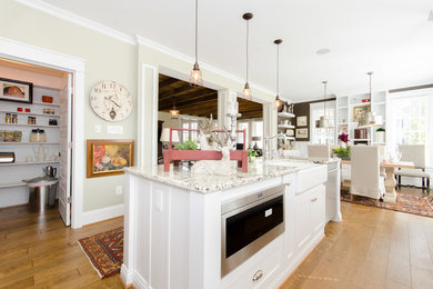 Example of a country kitchen design in Richmond
