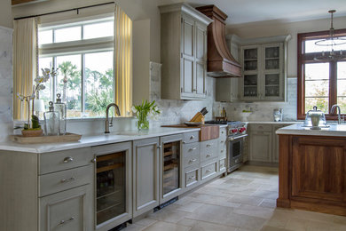 Example of a tuscan kitchen design in Jacksonville