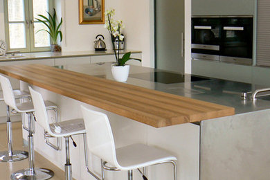 Design ideas for a contemporary kitchen in Gloucestershire.