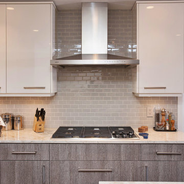 The new stainless steel range hood was vented through the roof and waterproofed.