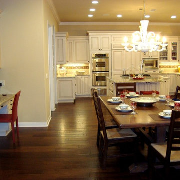 The Nolan Kitchen In Brookhaven Cabinetry, and adjacent desk/office area.