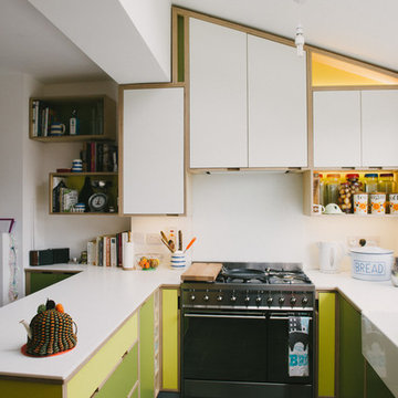 The Oubridges: Green & Yellow Laminated Plywood Kitchen