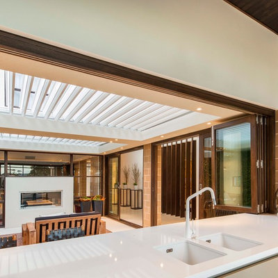 Inspiration for a contemporary kitchen remodel in Adelaide with a double-bowl sink