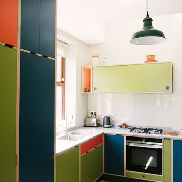 The Welchs: Green Orange & Blue Bespoke Plywood Kitchen