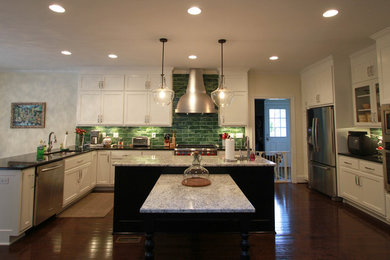 Example of a large country l-shaped dark wood floor eat-in kitchen design in Richmond with a double-bowl sink, flat-panel cabinets, white cabinets, granite countertops, green backsplash, stainless steel appliances, an island and porcelain backsplash