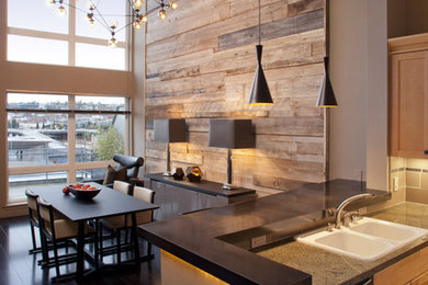Eat-in kitchen - mid-sized contemporary u-shaped dark wood floor and brown floor eat-in kitchen idea in Seattle with a double-bowl sink, shaker cabinets, medium tone wood cabinets, granite countertops, gray backsplash, porcelain backsplash, stainless steel appliances and a peninsula