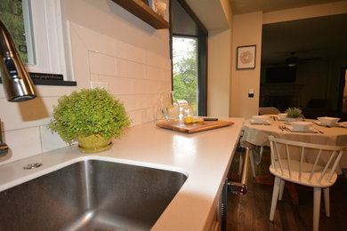 Eat-in kitchen - small transitional u-shaped eat-in kitchen idea in Philadelphia with shaker cabinets