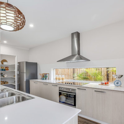 Inspiration for a modern kitchen remodel in Brisbane with a double-bowl sink