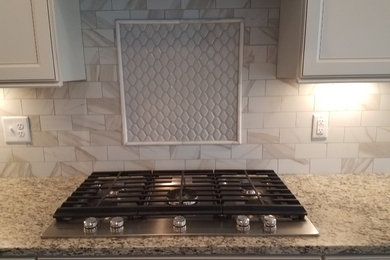 Example of a trendy kitchen design in Raleigh with multicolored backsplash and subway tile backsplash