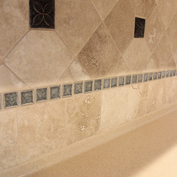 Tile Backsplash with Glass Accents and Oil Rubbed Bronze Cast Metal Tiles