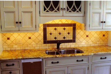 Kitchen photo in Philadelphia with multicolored backsplash and stone tile backsplash