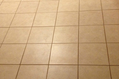 Mid-sized elegant l-shaped ceramic tile eat-in kitchen photo in Birmingham