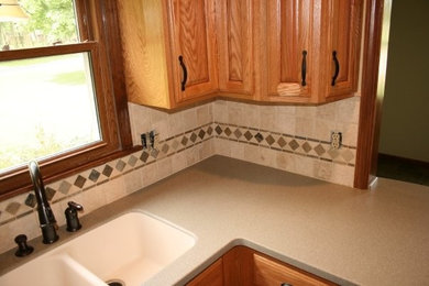 Kitchen pantry photo in Indianapolis with a double-bowl sink, beige backsplash and ceramic backsplash