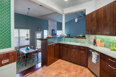 Small trendy l-shaped cork floor kitchen pantry photo in Austin with an undermount sink, quartz countertops, green backsplash, stainless steel appliances, flat-panel cabinets, dark wood cabinets and mosaic tile backsplash