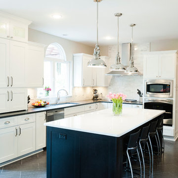 Timeless kitchen with white perimeter cabinets and a contrasting island