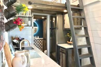 Small mountain style galley kitchen photo in Oklahoma City with quartz countertops