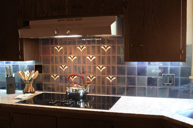 Inspiration for a mid-sized craftsman kitchen remodel in Minneapolis with ceramic backsplash