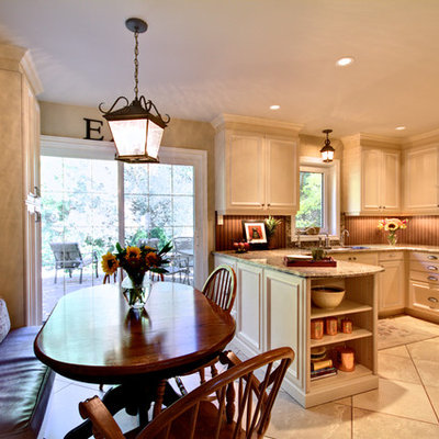 Elegant eat-in kitchen photo in Toronto